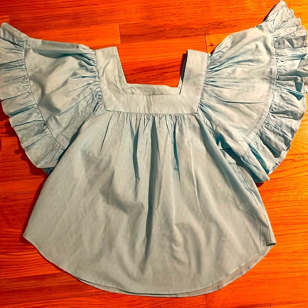 Bright blue top